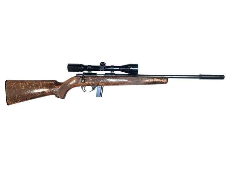 Buy 22 Stirling 1400 Blued Wood with Silencer and Scope in NZ New Zealand.