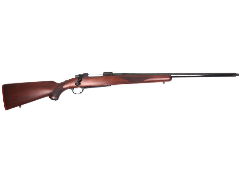 Buy 243 Ruger M77 Varmint Heavy Barrel Blued Wood Threaded in NZ New Zealand.