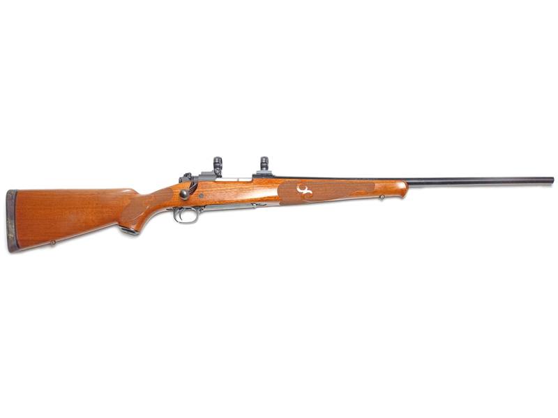 Buy 243 Winchester 70 Blued Wood 22" in NZ New Zealand.