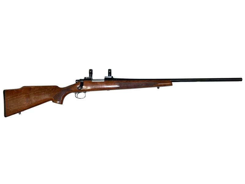 Buy 22-250 Remington 700ADL Blued Wood in NZ New Zealand.