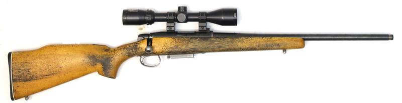 Buy 223 Remington 788 Blued Wood 20" Threaded in NZ New Zealand.
