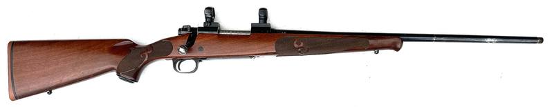 Buy 243 Winchester Model 70 Blued Wood with Rings in NZ New Zealand.