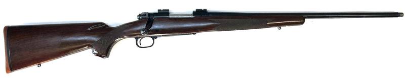 Buy 243 Winchester Model 70 Blued/Wood Threaded in NZ New Zealand.