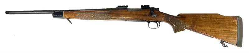 Buy 243 Remington 700 Blued Wood 24" Left Hand in NZ New Zealand.