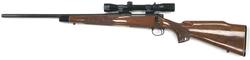 Buy 243 Remington 700 Blued Wood 22" Lefthand with Burris Scope in NZ New Zealand.