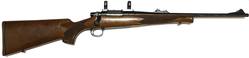 Buy 243 Remington 7 Blued Wood 18" with Rings in NZ New Zealand.